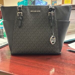 Michael kora purse